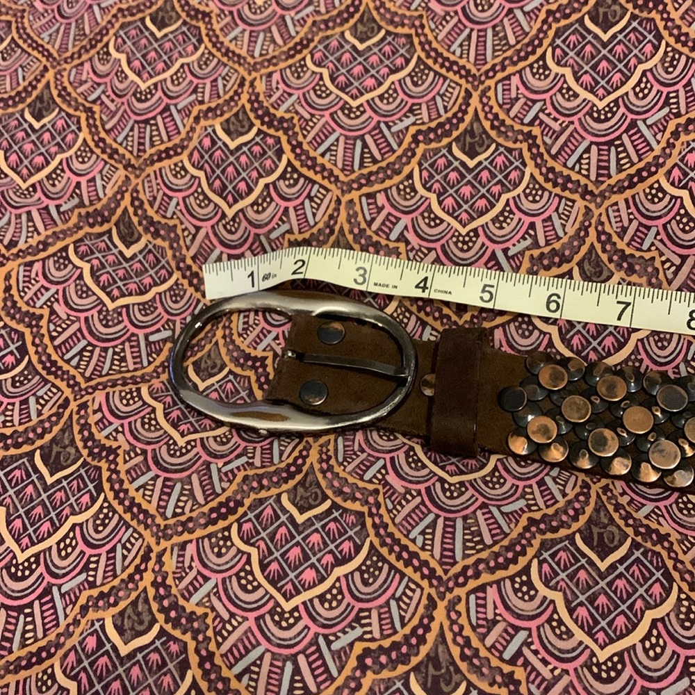 Brown belt with grommets